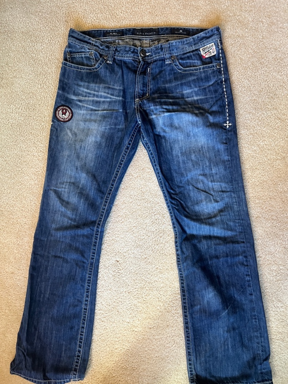 Affliction Blue Denim Jeans with Red & Blue Winged Skull Patch